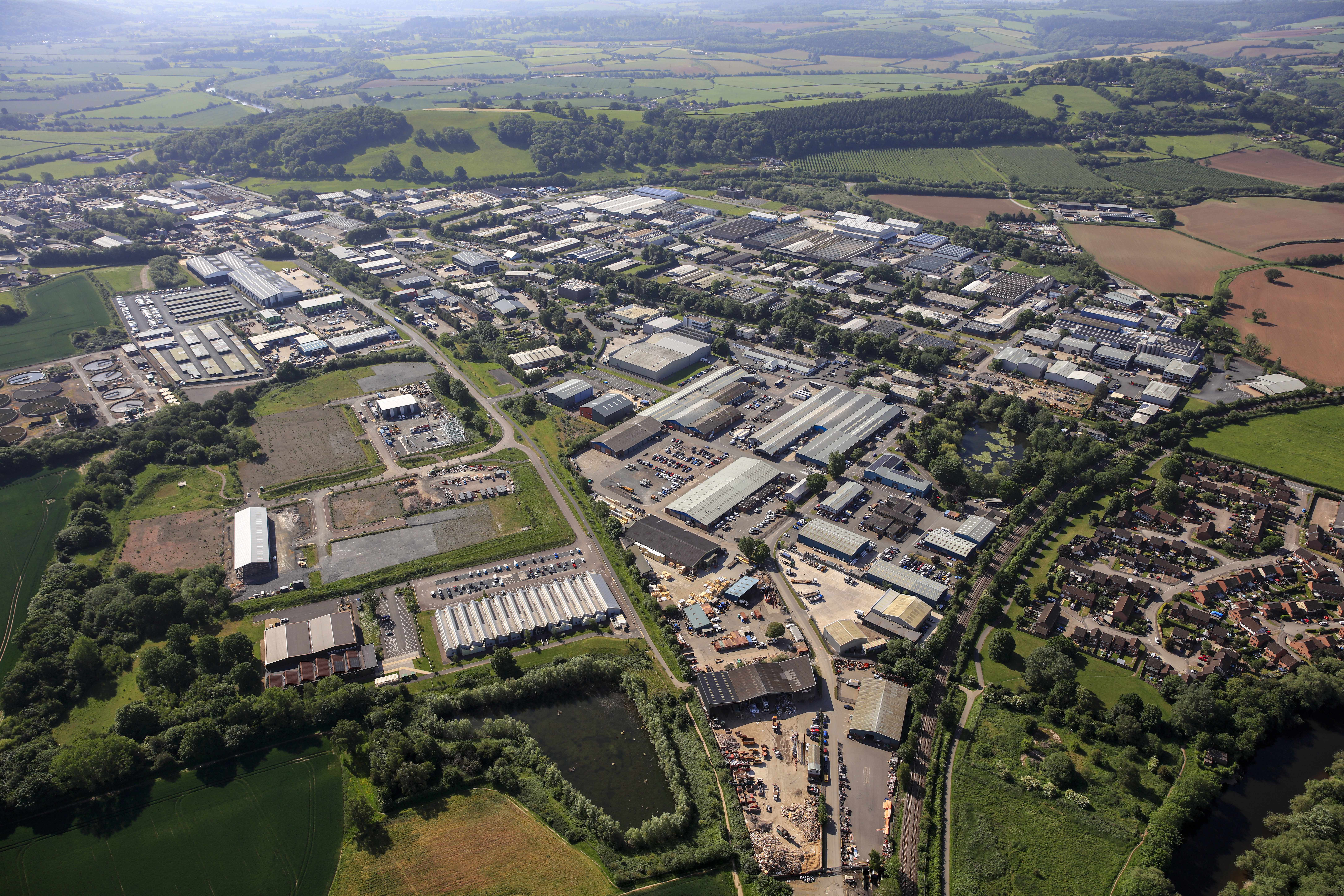 Drone shot of an industrial park showing warehouses and factories.