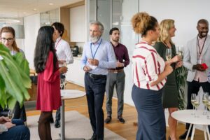 A group of business people networking at an event