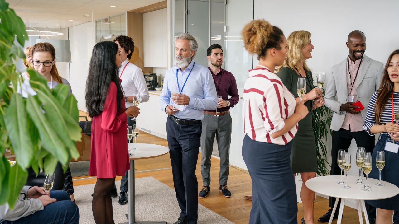 A group of business people networking at an event